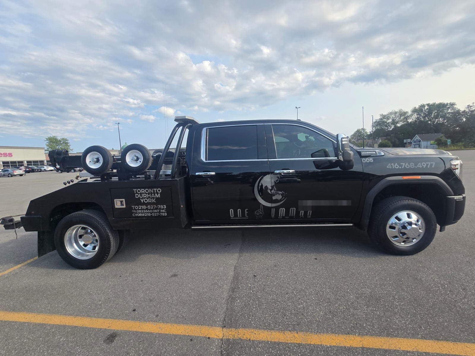 One Ummah Towing recovery truck standing by